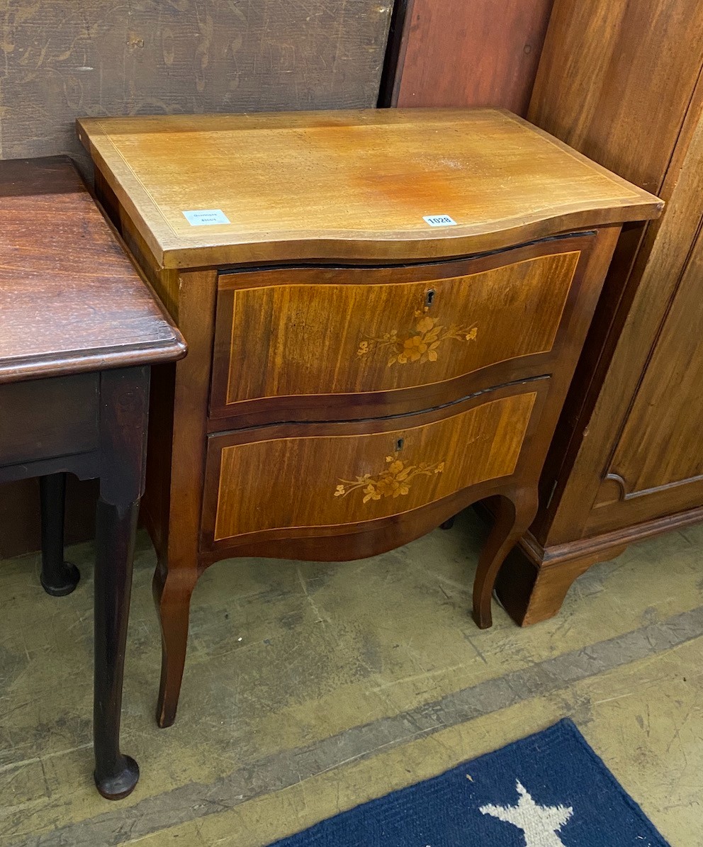 A French marquetry inlaid mahogany serpentine petite commode, width 61cm, depth 38cm, height 76cm